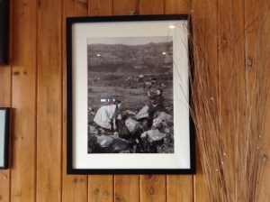 Framed MEM Donaldson photograph of children at St Columba's Well, Eigg, exhibited at Pier Café, Galmisdale, Eigg